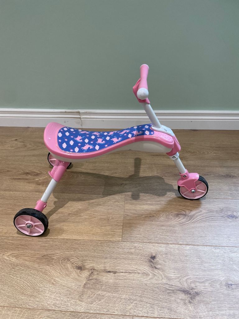 Pink and blue tricycle