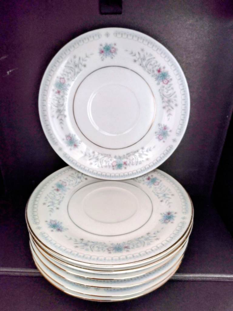 Many uses! 9 Large China Saucers all perfect. See the photos & details below!
