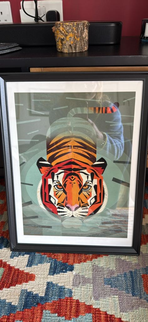 Selection of art prints, framed