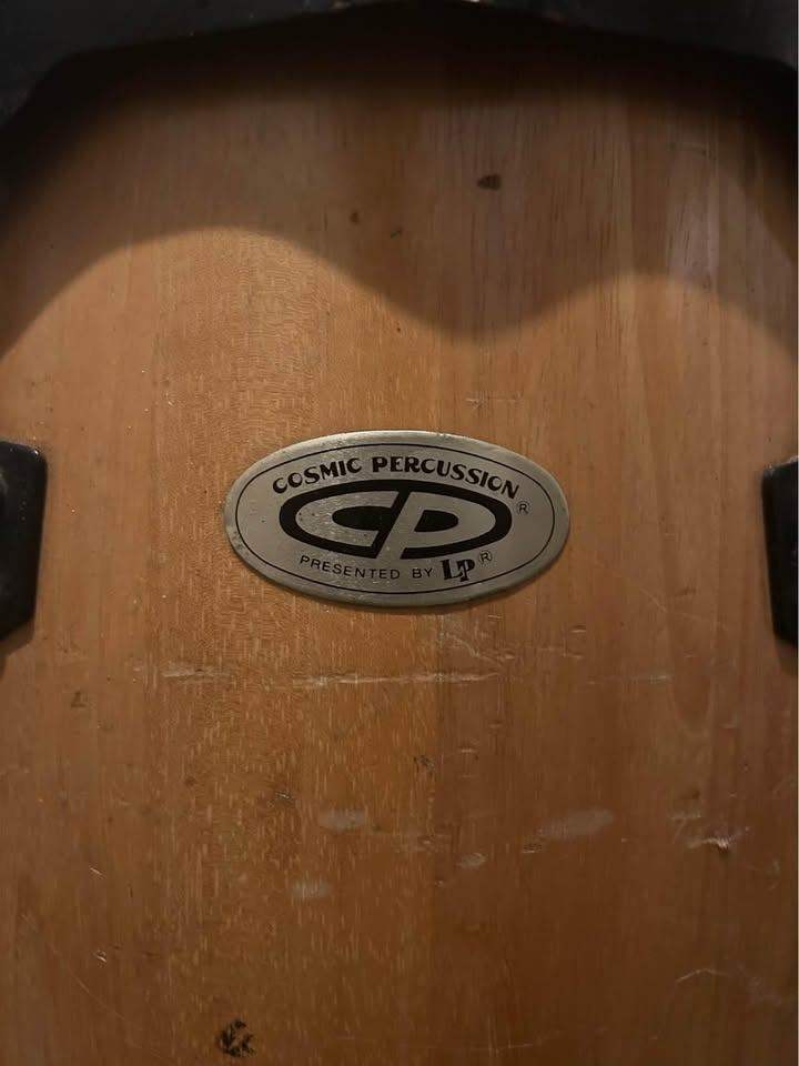 Cosmic Percussion (CP) wood conga drum.