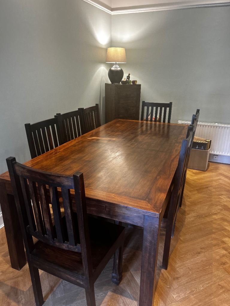 Solid Dark Wood Dining Table with 8 Chairs – Good Condition