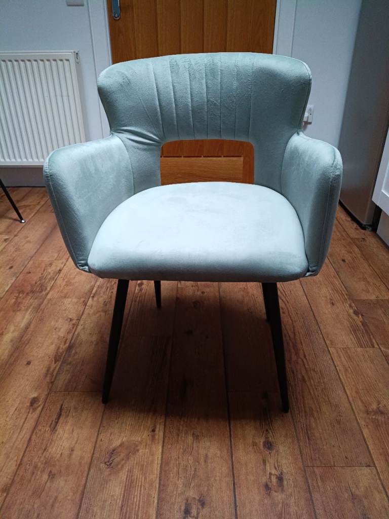 4 Light blue velvet dining chairs with black metal legs