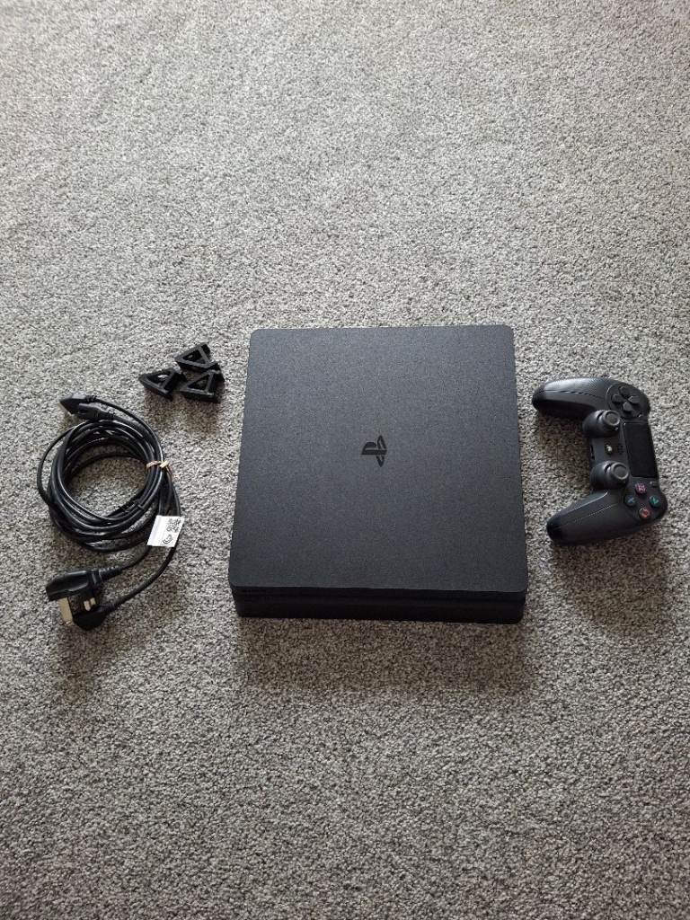Sony PS4 Console with Controller and Cables – Good Condition
