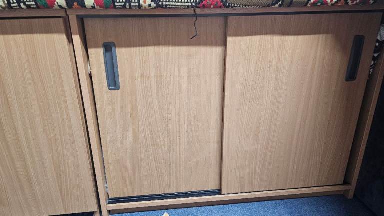 Wooden Storage Unit with Sliding Doors – Good Condition