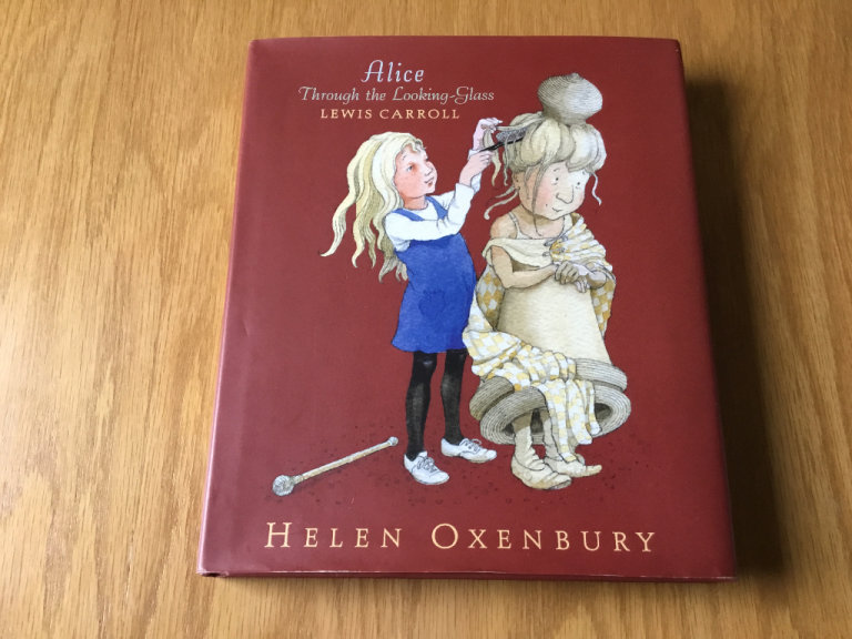UNUSED GIFT.  ALICE THROUGH THE LOOKING GLASS HELEN OXENBURY.