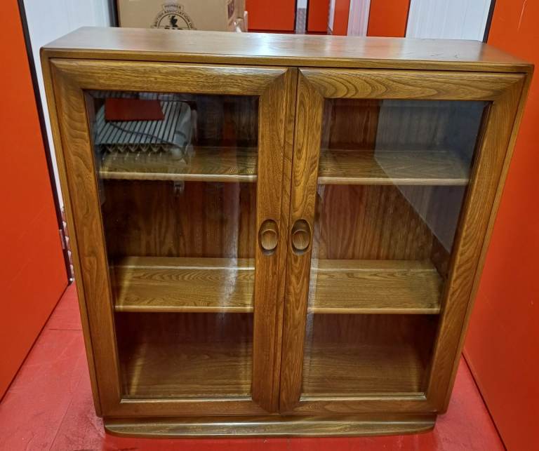 Ercol glass door bookcase/display cabinet