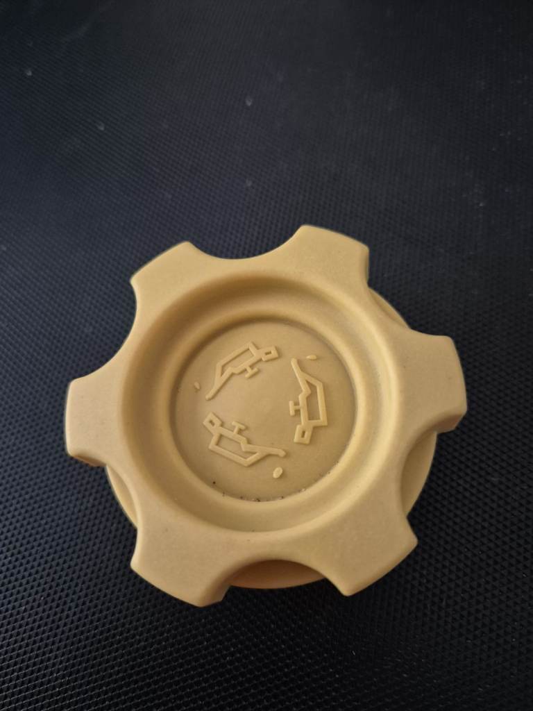 Various items for vehicles. Fuel and oil caps, indicator, Castrol Super TT 2-stroke, bulb H4 12V