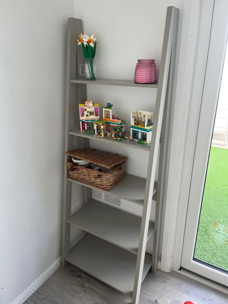 Grey ladder shelving unit