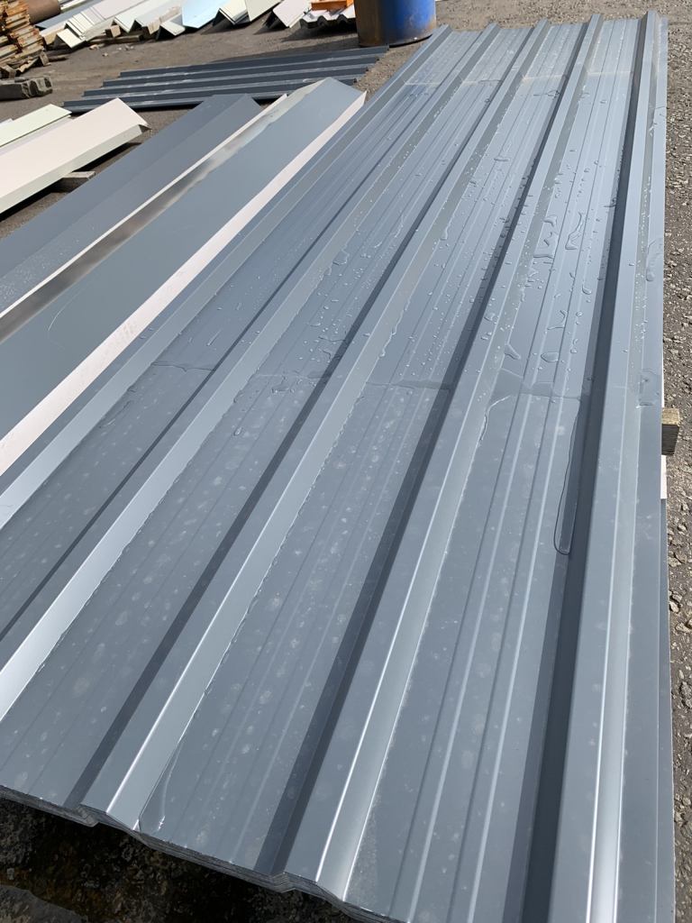 Sheets for roofing and cladding 