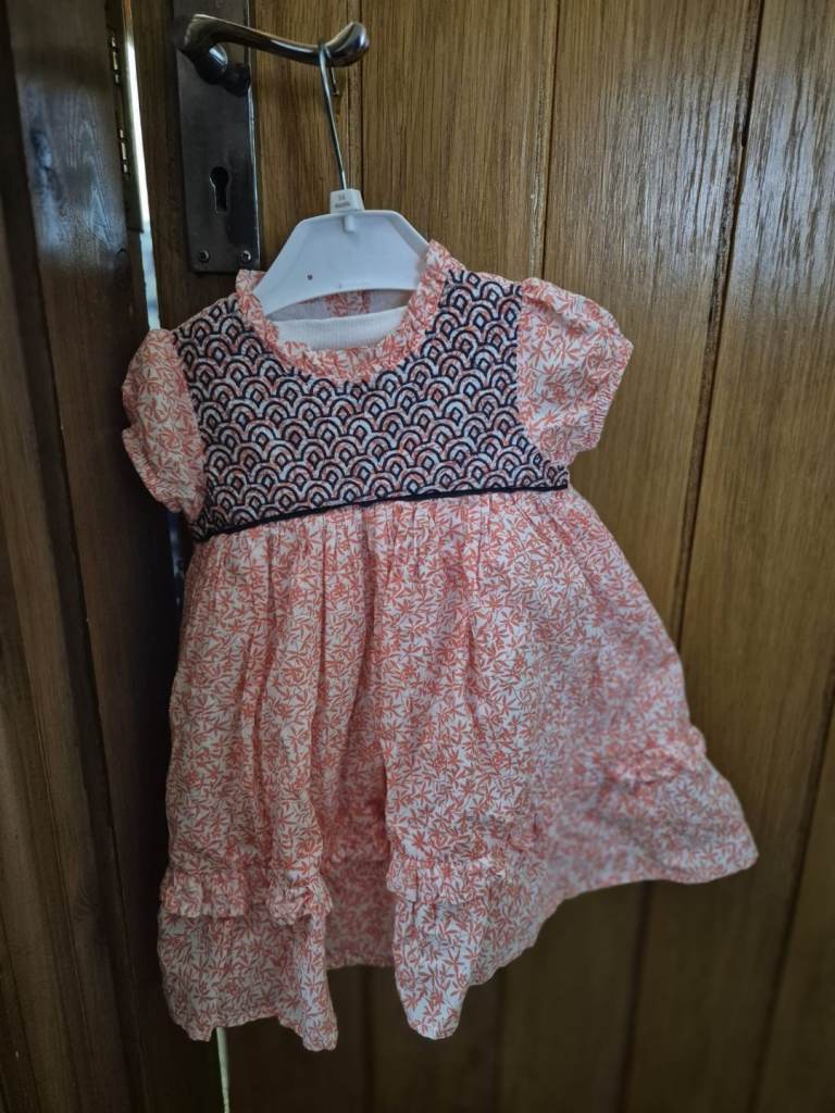 Pink ruffle neck embroided dresw