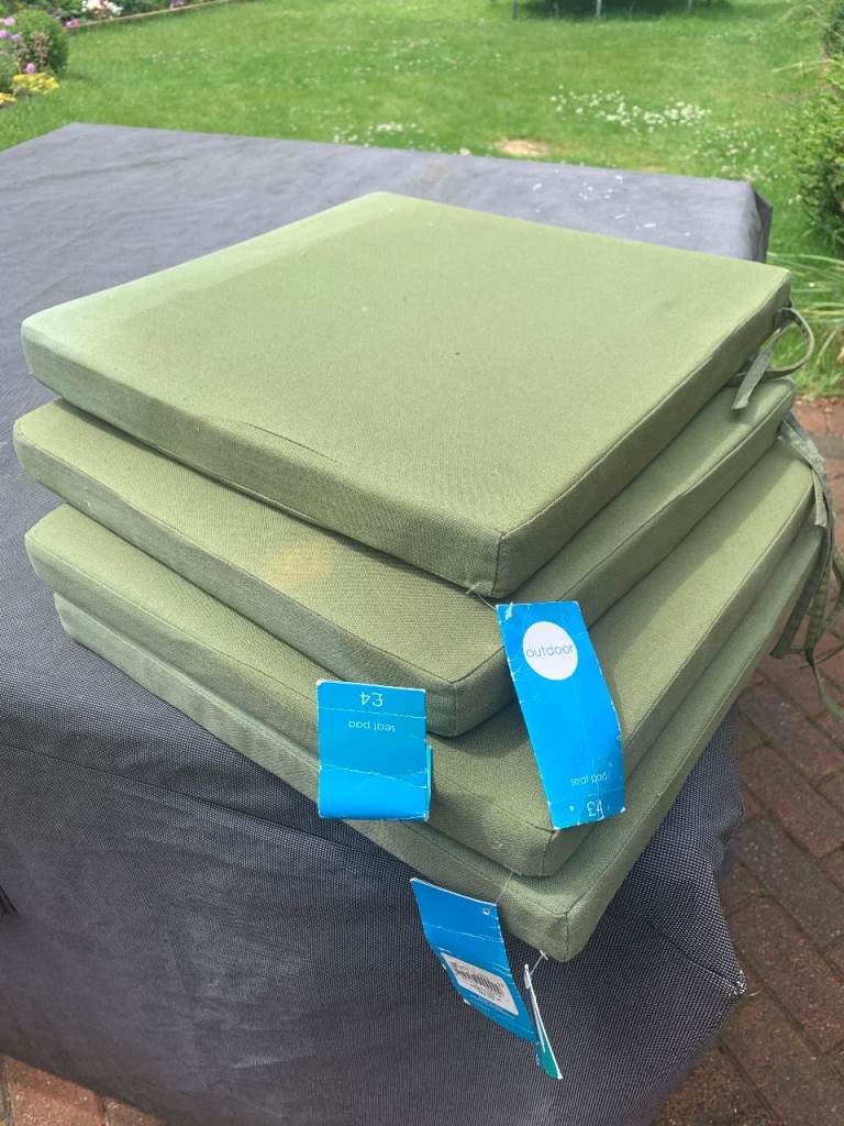 FREE - Four Sun Faded Chair Cushions.