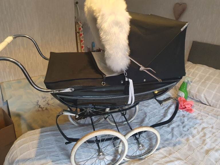 Vintage silver cross dolls pram 