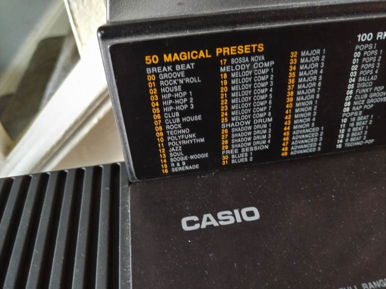 Electric keyboard Casio with power lead and stand in very good condition good working order 