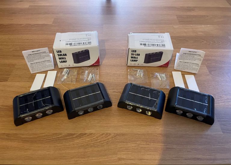 Solar LED outdoor wall lights – warm white / 4-Pack, for garden, fence & pathway