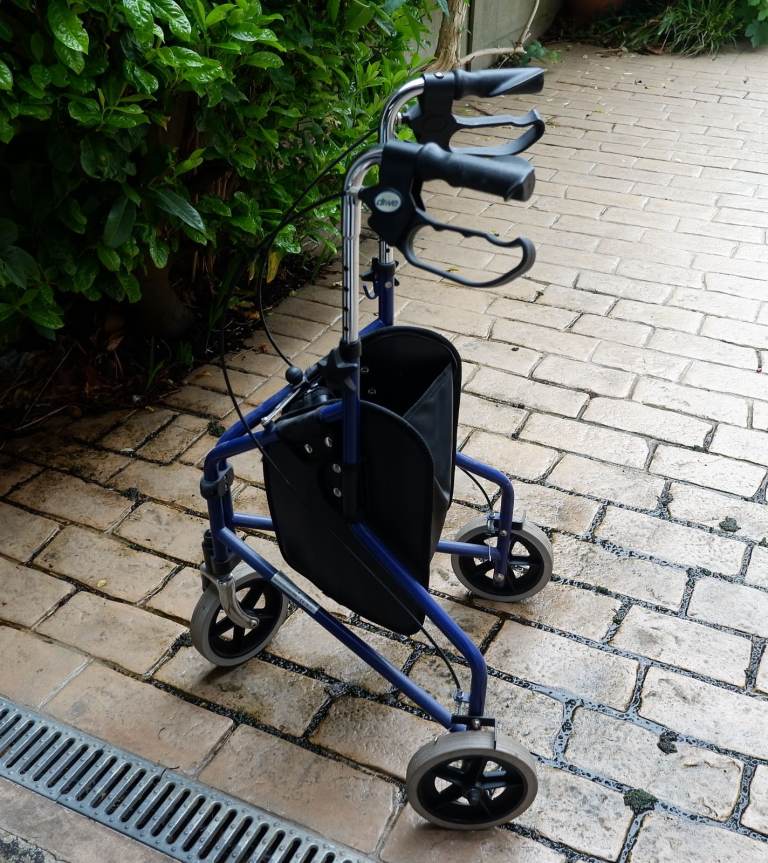 Blue three-wheeled walker 