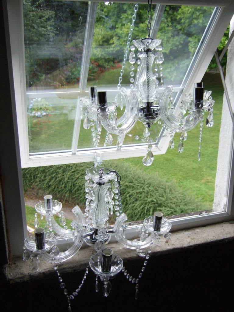 Marie Therese 5 arm chandeliers. Two available. Used once.