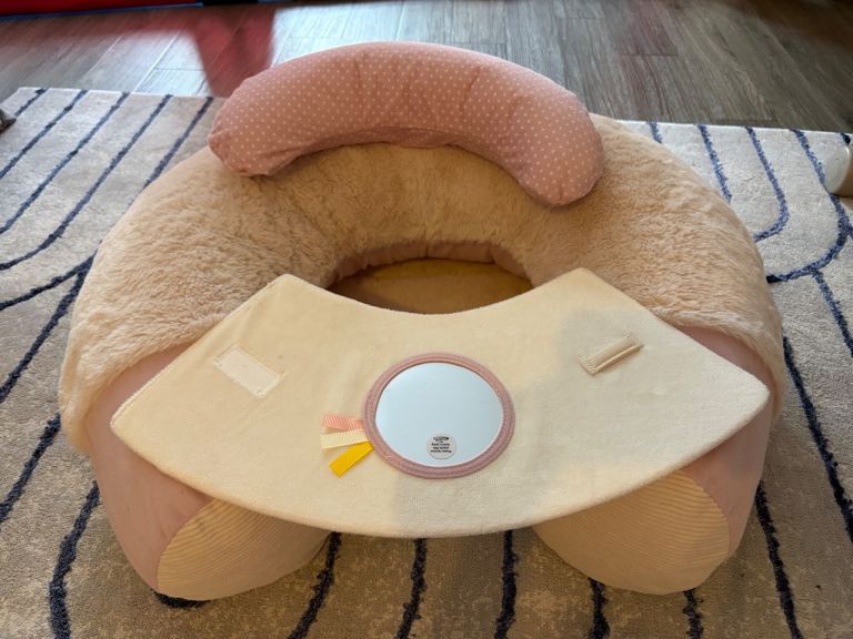 Nuby baby support pillow with activity panel