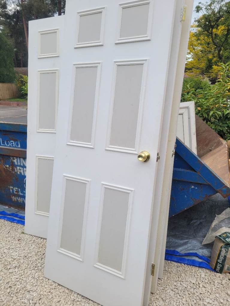 Free 5 interior doors with brass knobs plus a matching pair of cupboard doors