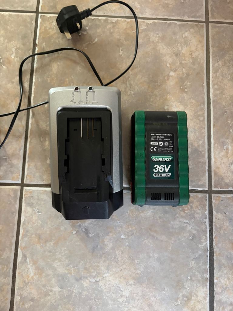 Qualcast lawnmower battery and charger 