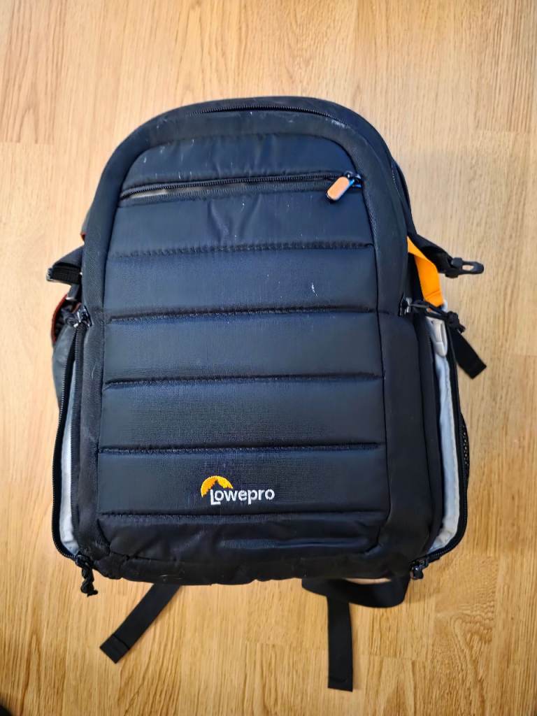 2 canon cameras with loads of accessories.