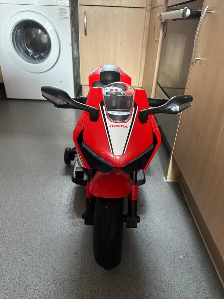 Kids red electric motorbike 