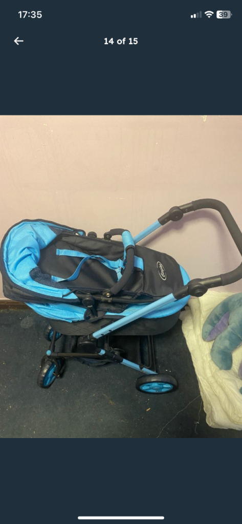 Blue doll pushchair 