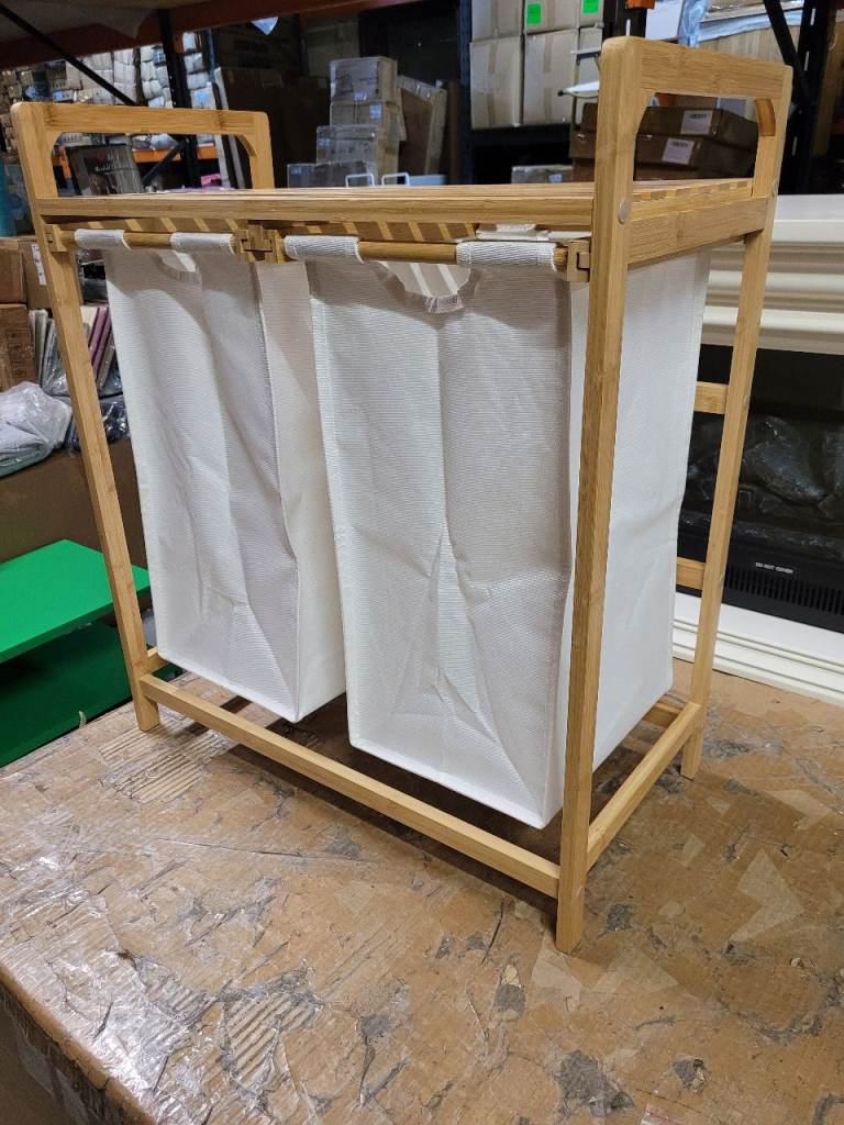 A new  bamboo style double pull out laundry hamper and stand you can Pull 