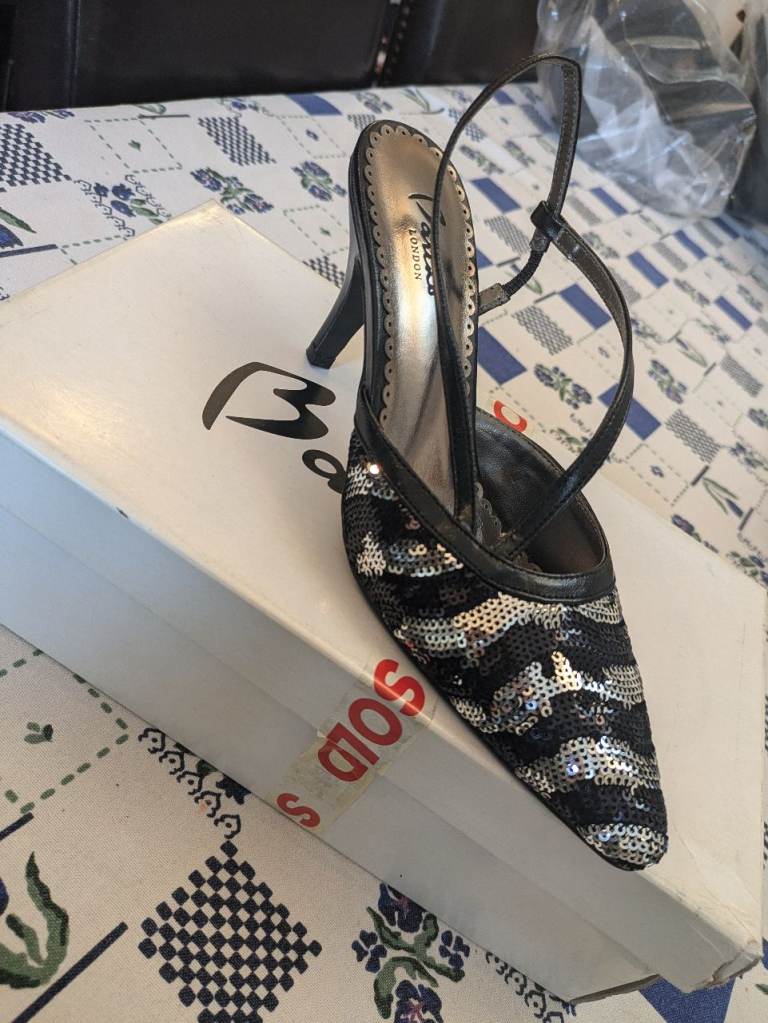 Over 50 pairs of mostly brand new women's shoes, heels, flats, boots. 