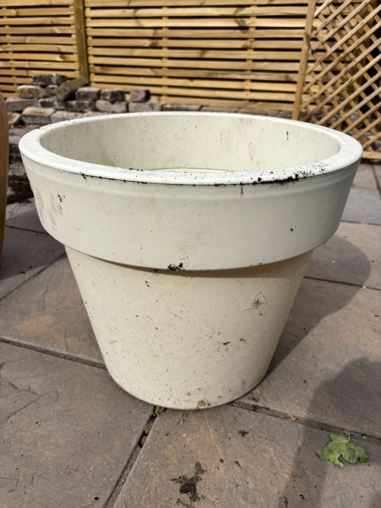 White plastic garden pot
