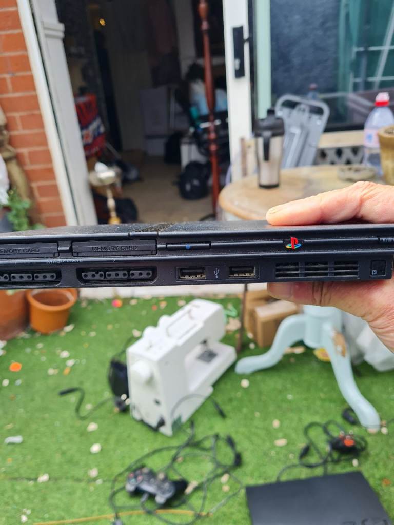 Ps2 console slim with 2 games