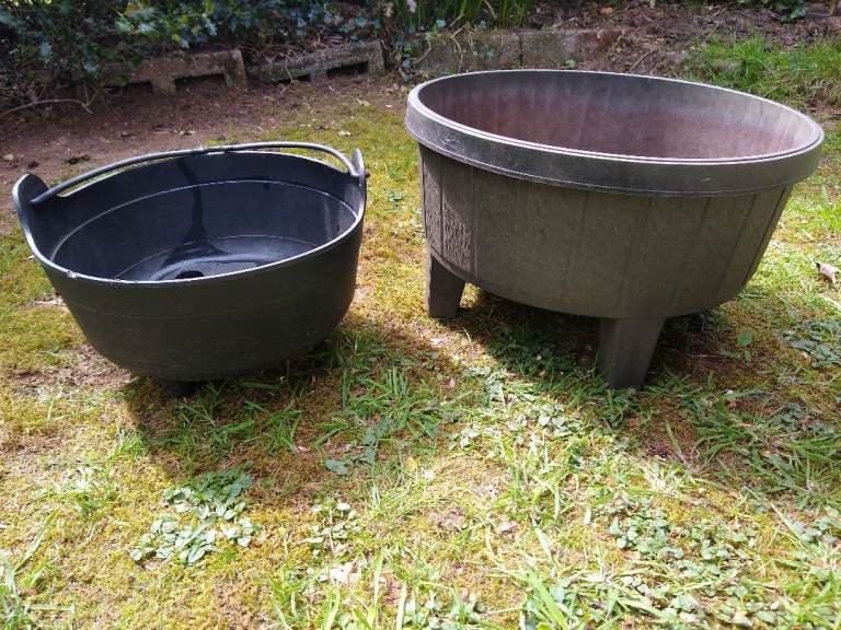 A Pair of Black Plastic Planters / Large Plant Pots