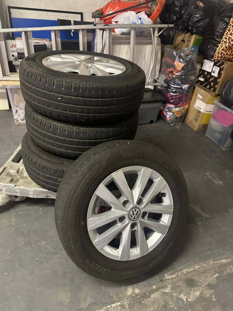 Set of 4, 16-inch genuine Volkswagen Clayton alloy wheels.