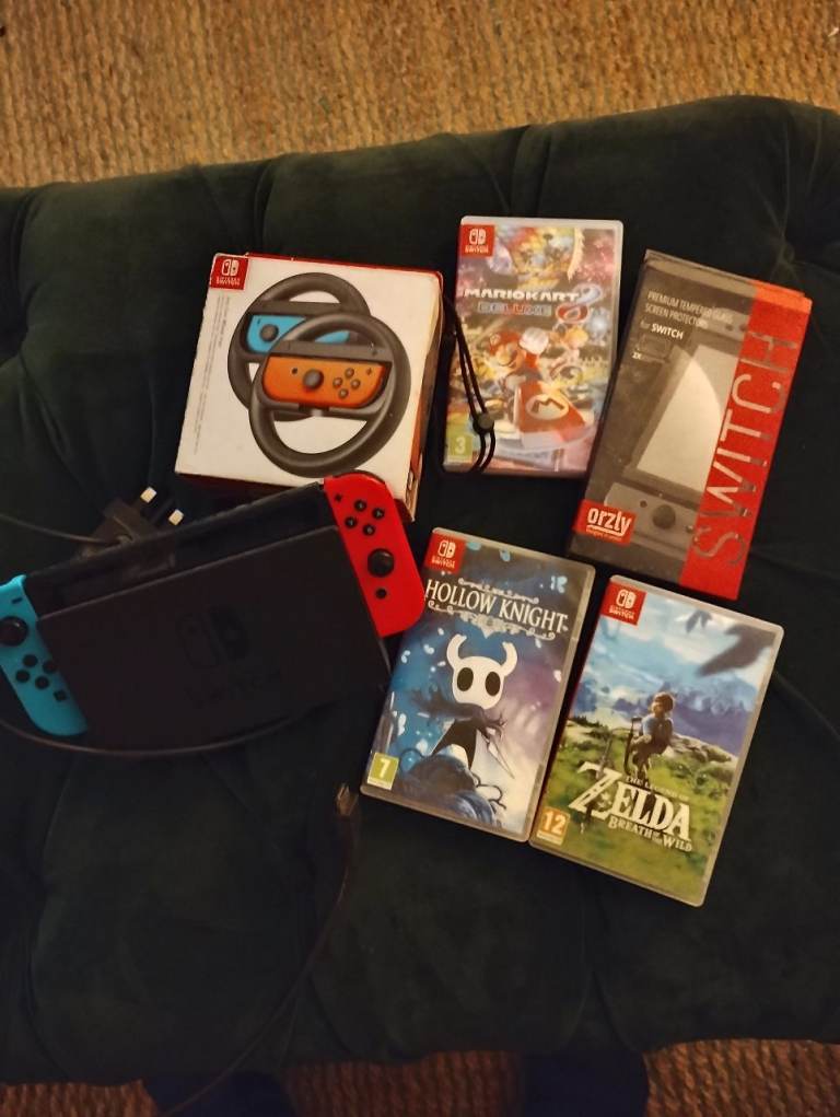 Nintendo Switch Console with Games and Accessories – Good Condition