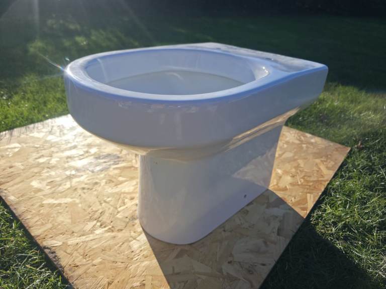 Brand New Roca Rimless Toilet