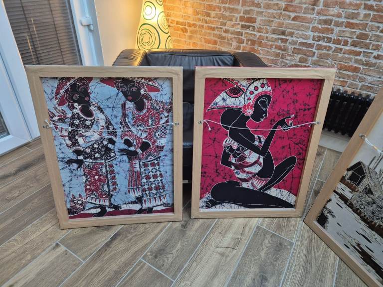 Four batik pictures on wooden frames