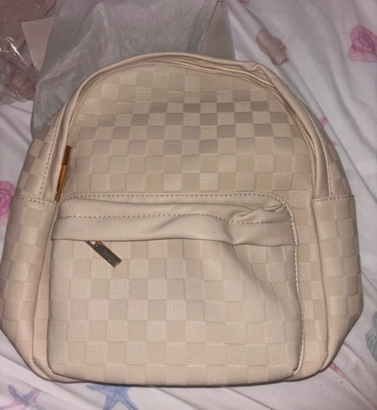 beige checkered backpack