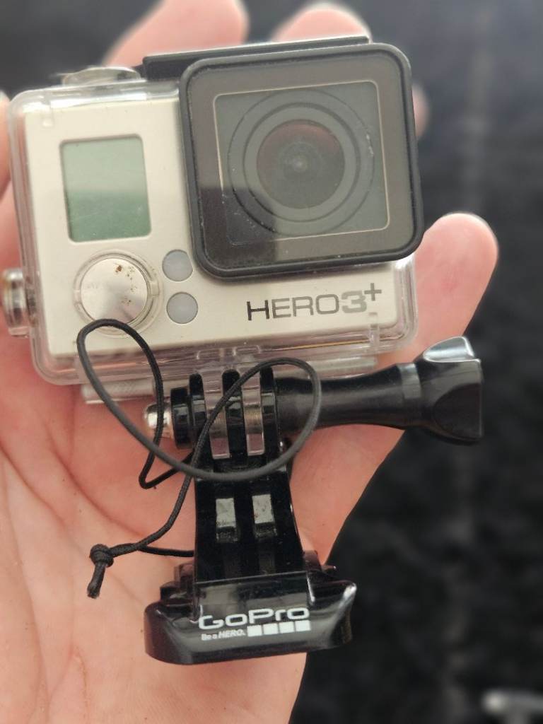GoPro HERO3+ Action Camera with Mount and Grip – Good Condition