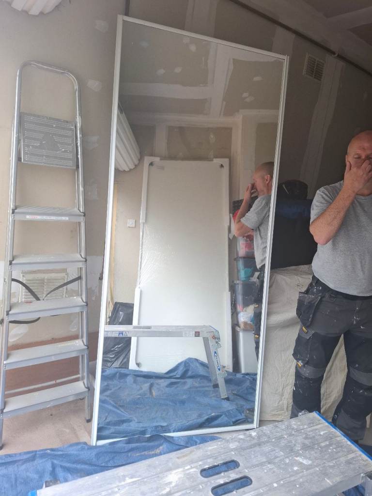 Sliding mirror doors