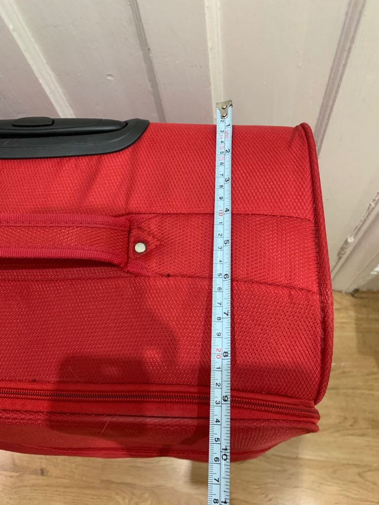 Large Red Suitcase with four Wheels 