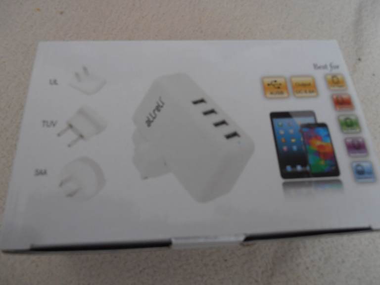 NEW -- unused-- USB Power Adapter , 4 interchangeable plugs.  4 USB outlets