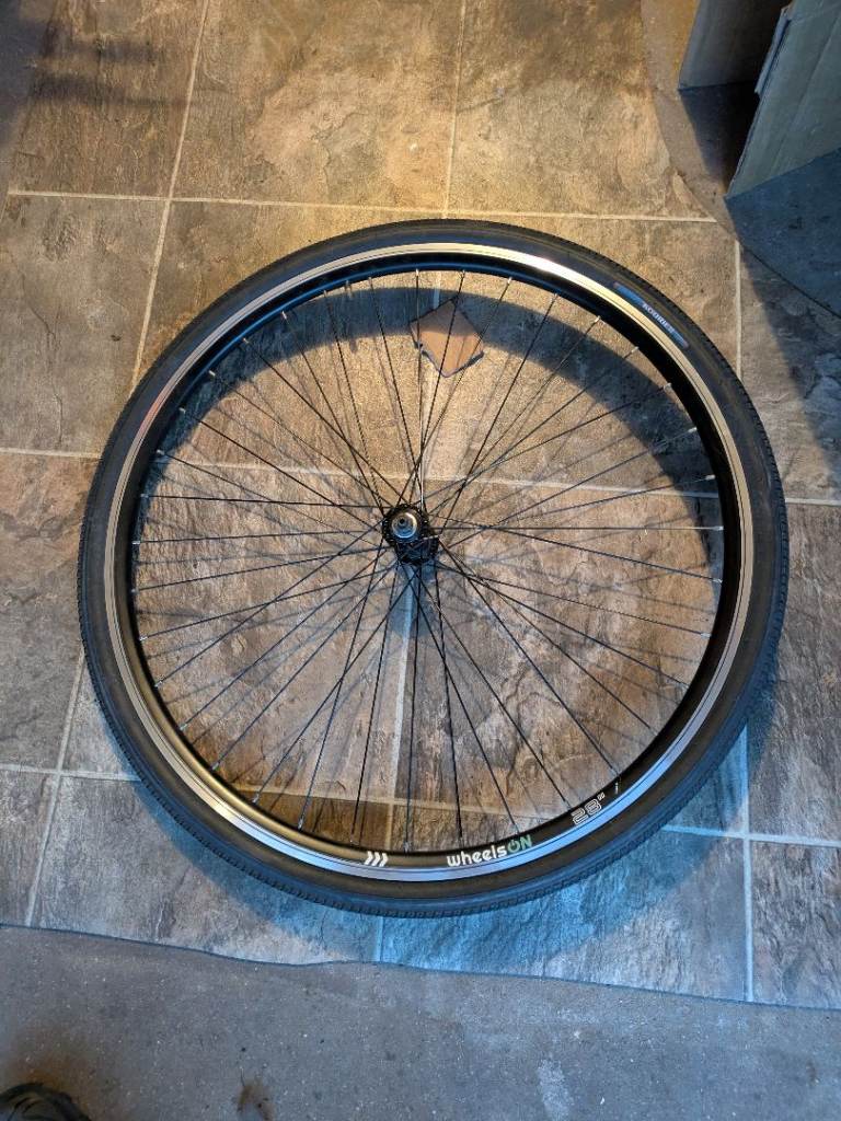 Bicycle front wheel for hybrid bike. 700c x35 with tyre. Like new