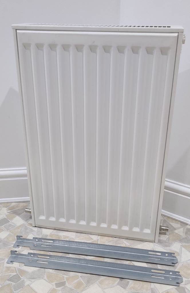 Central heating double radiator including brackets and covers