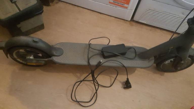 Electric scooter with charger