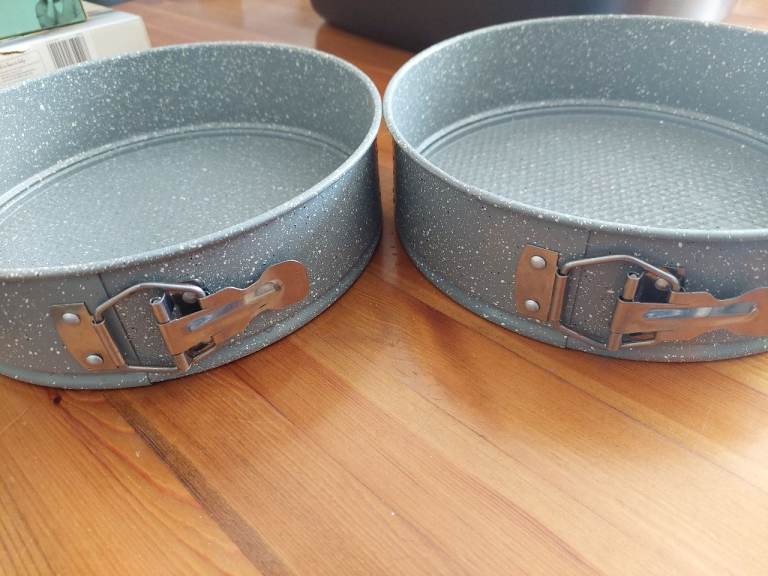 Set of brand new unused baking pans and racks