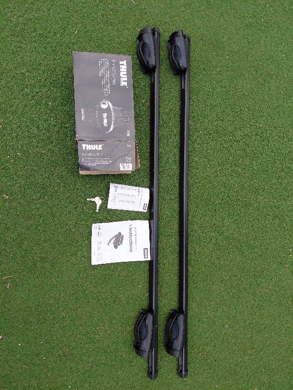 Genuine thule roof bars with 775 foot pack