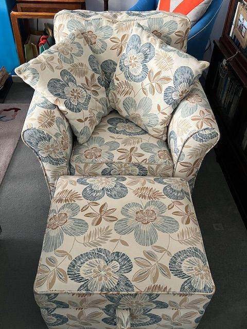 image for Beautiful large floral print armchair with matching footrest and cushions.