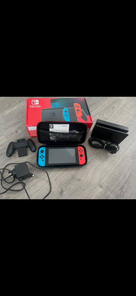 Nintendo Switch Console with Dock, Joy-Cons, and Case – Good Condition