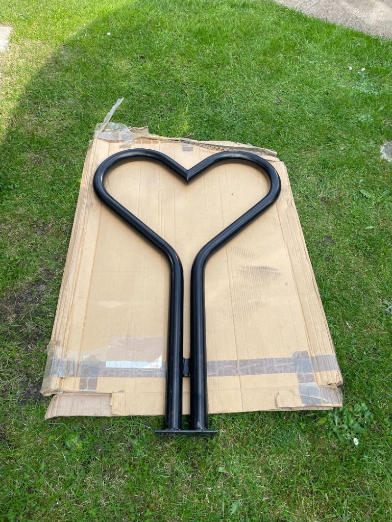Love heart shape bicycle railing.
