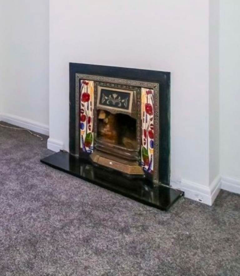 Cast Iron Decorative Fireplace with Colourful Tiles