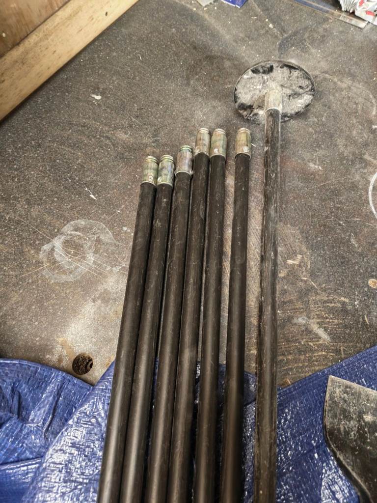 7 drain rods with one plunger head